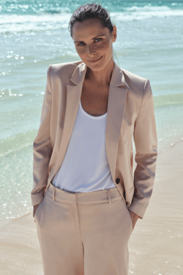 Woman with a suit at the beach 