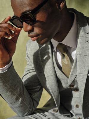 Man with a suit and sunglasses 